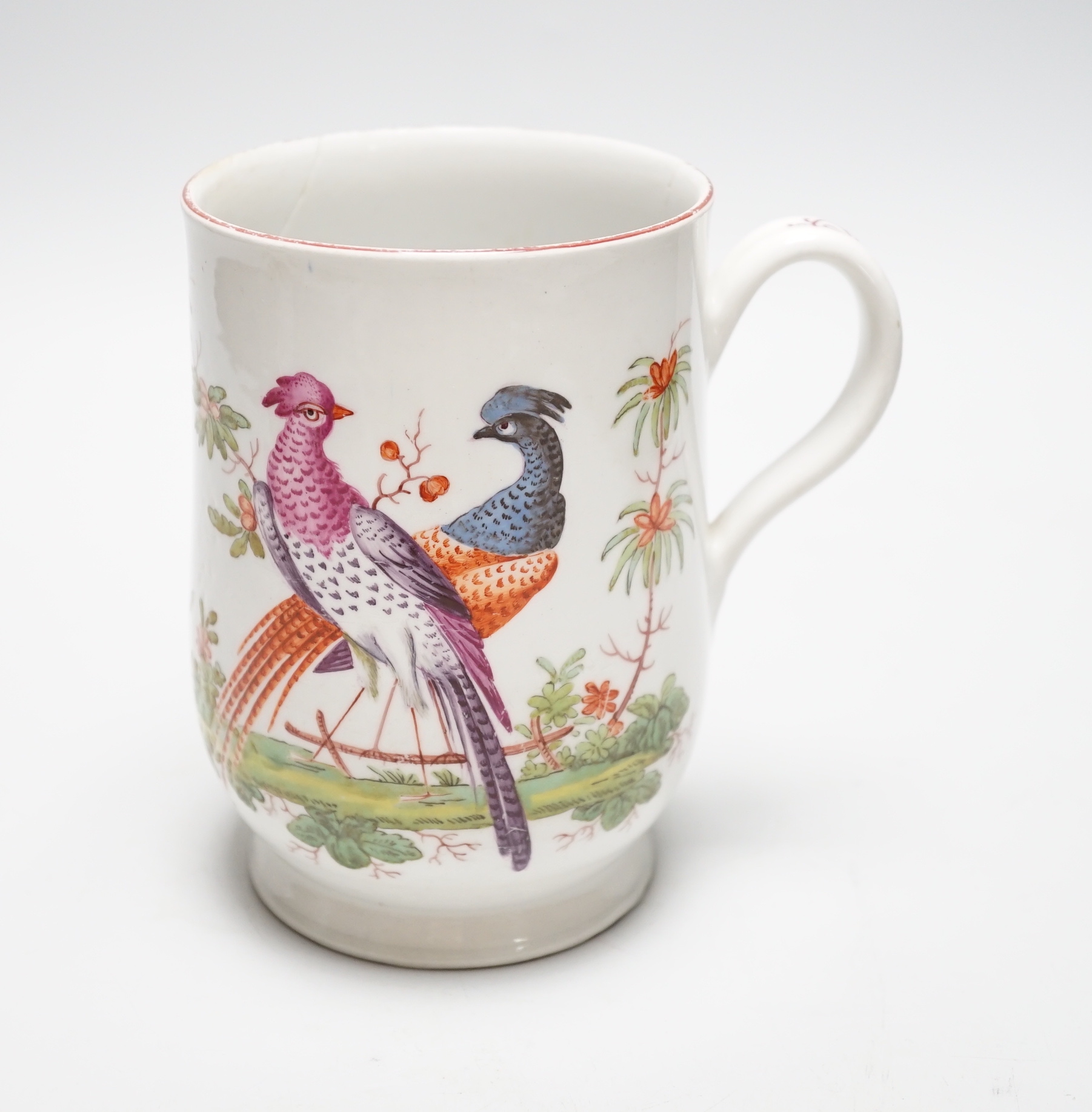 A large 18th century Bow ‘Fantastic Birds’ porcelain mug, 15cm (a.f)